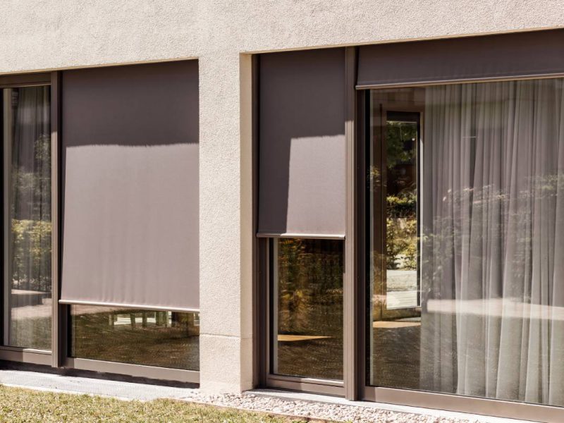 Outdoor solar shades for windows blocking sunlight in a home near Helena, MT